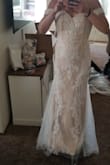 This dress is beautiful but didn't flatter my body type. In all other dresses, I am a size 4, and this one wouldn't even zip in a 4. Size up if you are ordering. - Danielle H.