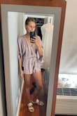 Love the satiny feel of this romper. Fits great! I can't wait to wear it out! - Laura S.