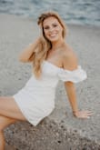 Bought this dress for my engagement photoshoot. It did not disappoint and was comfortable. - Kayley O.