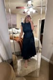 This dress is a flattering fit for my large bust and apple shaped body. It offers a lot of stretch and comfort, while still offering an elevated look. The color is not as it is in the pictures online, which was disappointing. What made me the most sad was it shipped with a hole in the fabric on the waistline that I will have to pay additional for, to fix. I wish the fulfillment staff would have paid a little more attention to those details. - Morgan W.