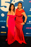 The shade of pink is very pretty and universal. The material was incredibly comfortable and yet form-fitting. It was a bit long on me but I didn't mind at all. I absolutely love this dress and had so much fun wearing it! - Carla A.