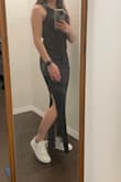 I am way too short for this dress. It shows as midi length on the model and it is ankle length on me. I kept it because I thought I would get it tailored. The material is nice and thick and fits nicely other than the length. - Brianna S.