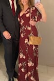 I purchased this dress for an evening wedding and it was perfect. I debated whether to get a small or a medium as I am a size 6 and a small fit great. I was glad there was a snap already at the bust because I would've needed to pin it. It takes a minute to figure out the wrap part of the dress but once you have it wrapped, it's very secure. Tall girls will definitely like this dress. I am 5'5 and I had 2 1/2 inch heels, and it was just barely touching the ground.
The color was beautiful for an early fall wedding, and I got a lot of compliments. You can dress it up with jewelry and heels, or add a leather belt and short boots and dress it down. - Jessica K.