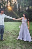 I ordered this dress in a small and x-small and ended up going with the x-small. I had it altered because it was really long on me. The zipper was also a little stiff but I made it work. This dress is perfect for a barn-style wedding! - Karolina F.