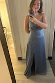 Huge fan of this dress. It's not typically my style, but this is just so flattering. Adjustable straps are super helpful for fit. (There is a hotel key card in my shirt in this photo, I promise it doesn't have any weird flaps.) - Elise T.