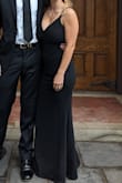 Pretty comfortable dress. I was able to wear a regular black bra with it - was visible in some areas but not enough to need to do something about it. Did need to be hemmed a decent amount but I am short - Melanie C.