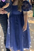 I got so many compliments on this dress! It felt like a nice balance between fun and formal. The only issues I had were the sleeves were a bit poofy for me, the front didn't lay well with my large chest, and I didn't realize I couldn't wear a normal bra with it. But I loved the fabric and length. Hoping to get to wear it again. - Emily N.
