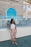 I bought this beautiful satin wrap midi skirt and it was perfect for walking around Capri Italy in the hot sun. It kept me nice and cool. I also wore it to a friend's baby shower later that month. I'm sure I will get many uses out of this well made satin piece. - Annette G.