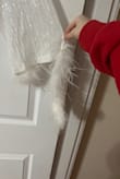 Bought this for my reception. It is cute, but it was not good quality. Only 10 minutes of wearing, the fuzz on one of the sleeves broke and was hanging down. The slip under the dress is super small and see through. - Rachel S.