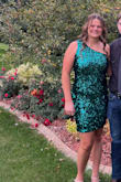 This dress was absolutely stunning on! The color is beautiful and the length is perfect for my 5'10" daughter. Very nice quality dress priced right. - Jodi K.