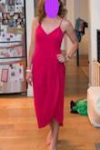 This dress is really cute and flattering! It's comfortable. I love that I don't have to wear a bra, and it's not too long for a shorter girl. I like that it looks nice for all occasions. The slit makes it a bit sexy, too! The color is darker than a hot pink. I can't wait to wear it as a guest at a wedding next month. I've read it wrinkles easily, so I plan to steam it a bit after traveling. - Lila M.