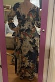 I absolutely loved this pattern and the fabric in both blue and burgundy! The slit was great, visible with a little movement but not too revealing. The height was perfect with flat shoes. Unfortunately, it was slightly big on me (size 8-10, usually 8) and would have required fashion tape around the bust. It also emphasized my hips, which is not necessarily a negative. I ended up going with another dress. - Lara M.