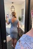 I was unsure if I should order a small or medium since I typically get small but the fit finder suggested medium. I went with medium and the bust/shoulders fit nicely as well as the legs/booty area. It is a nice classy length and the cut in the back is very flattering. There is a ton of extra material on the front side of the waist but not the back side of the waist. The front side is lackluster and baggy on my small waist. If your waist is not as small then this dress will probably fit really nicely. If I had purchased for a specific occasion it would be worth it to get this tailored at the waist because it is a beautiful color and material and fit otherwise. - Annika S.