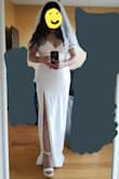 10/10 would buy it again. I got it as my wedding dress for a courthouse ceremony and I'm absolutely in love. Hugs my body very nicely and looks gorgeous when paired with good shapewear and shoes. Pro-tip, you don't need a bra with this dress since it's not see-through, but if uncomfortable, get pasties. I chose XS based on other reviews. Given my height, I do have to have it hemmed a bit but it's not a deal breaker. Overall a great dress. - Andrea C.