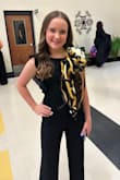 The suit fits my daughter perfectly with heels; my daughter is short. The material is nice and easy to care for. It doesn't wrinkle easily. - Crystal W.