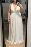 The dress is beautiful. Just a little big for me, maybe because I have small breasts. I'll have it fitted to me. I'm still happy with my purchase. - Cristhell D.