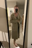 I bought this to have a loose, go-to cardigan during my pregnancy this Fall that I could layer on top of any maternity outfit. I chose the neutral coat to go with anything and feel more put together but it really just looks and feels like soft carpet and has almost no structure and the buttons don't actually button. They're just for show. So I don't hate it but I don't LOVE it. It feels very Gen Z loose/baggy/borderline grunge/homeless. - Katheryn S.