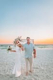 This dress was perfect for a beach ceremony. I didn't want to deal with an elaborate dress with a train while trying to walk on the beach. It was simple and elegant. I wore it with shapewear boy shorts and backless stick-on cups for bra support. I'm tall, 5'10", and the length was perfect. - Brooke B.