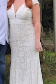 I loved this dress! It was elegant but simple enough. It was very lightweight and easy to move in. Not one alteration was needed. the front was just low cut enough and the waist cinched everything in nicely. I opted for flats being that we were outdoors and I'm short so a low heel would have really made this. Overall, 1000% happy with my decision. - Lauren B.