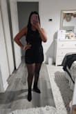 This romper is incredibly cute and versatile; perfect for summer and easily paired with stockings for the winter. The only inconvenience is having to strip to use the restroom, but it fits me so well and is quite flattering for the tummy area. I'm 5'2, and the short size is about 4 inches in length; for someone taller, it might be too short. I recently wore it for dinner with stockings and boots, and the look was amazing, garnering endless compliments. - Fatima G.