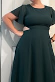 I loved this dress a lot but didn't find it that flattering on me so I did end up returning it.  The top was slightly tight on me, but not too bad.  I could've lived with it.  The color is so so dreamy.  The length was perfect. - Avery K.