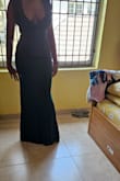 I love the dress. It's a perfect fit save for the bust area. I will have to take the sleeveless part up a bit for it to be firmer,  but everything else fits perfectly. An extra small would have been too tight so I don't mind taking it. - Olamide S.