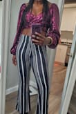 I bought this top for a studio 54 themed bday party and it was perfect! Will absolutely be wearing again for a night out. I ordered a size small and it fit true to size, very comfy, and the color is gorgeous! - Raven O.