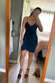 The material is heavy enough to hug your body and give some nice shape but light enough to easily move around. Super flattering fit and color is rich and true to the photo. Very sexy but long enough on my legs where I don't feel too revealed. - Jacquelin S.