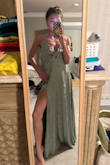 This dress did not need any altering. It fits true to size and looks amazing! I love the material. It's high quality and it looks beautiful in all lighting. - Sabrina D.
