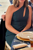 Purchased this for a wedding and it was perfect! Comfortable dancing all night with a strapless bra. Meant to put a little fabric tape on the slit across the chest so it didn't dip too low, but it was fine without it. - Michelle S.