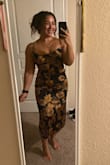 I absolutely love this dress and I received a lot of compliments! The dress doesn't have a stretch to it whatsoever so it is true to size. I ordered both a medium and a larger and ended up going with a large simply bc it didn't zip all the way due to a wider back but the medium for perfect everywhere else. If you have more of a curvy athletic shape body definitely stick your size or size up to compare differences. Usually, I'm a medium but had to go with a large. - Isamar C.