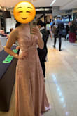 The dress fits perfectly and is absolutely beautiful. - Natalia O.