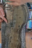 I bought this dress 2 months before my cousin's Long Island wedding. The fit was great, loved it. I tried it on only 2 times and the glued-on sequins are falling off! I treated it delicately and hung it, but the sequins were dropping like flies. It is quite noticeable and makes the dress look very cheap. The wedding is next weekend and I am so disappointed. Lulus, is there anything you can do to make this better? I thought the quality would be a bit better given the price. - Julie D.
