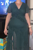 I guess it looked better on the model, on myself, I look like a sumo wrestler. Honestly hit me in the confidence. Beautiful design and color, just not a fit for me I guess. I'm not a big woman and it makes me look huge! - Sami V.