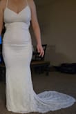 I have to say I am a frugal shopper...I can't do it any other way. I've bought probably 5 dresses in total from all different vendors. So far they've all been too cheap looking. This one is affordable and was anything but cheap-looking. Great quality & feel, even better in person. It's definitely "the one". The lace is stunning & the back is gorgeous. It is so lightweight & comfortable. It's stretchy so will complement any body type. I bought this for a casual beach wedding & it was exactly what I was looking for. Once the ceremony happens I will update the pictures. Also was the ONLY dress that came with a bag to store/travel with. Thank you Lulus, you overdelivered! xo - Katrina R.
