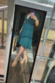 It was made of this crepey, lightweight material and probably would have been fine to wear to the wedding I'm planning on going to. The overall silhouette of the dress was flattering and adjustable given that it's a wrap dress. 

Although like other reviews have mentioned the v-neck is very deep and there was definitely room in the top. I could definitely see some accidents happening there and would recommend some sort of fashion tape to avoid any accidents. Or, I also tried it with a lacey bandeau and it looked fine with that. 
Something else that I was a little disappointed about was that the sleeves didn't look as good on me. Whenever the sleeves split and showed my shoulders it made me look wider than I'd like.
Overall, a cute dress, but somewhat accident-prone and not for me. - Vic L.