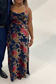 I loved this dress so much. It's got a seam right under the bust and then slightly flares out from there so it gives you this pear shape that I loveeeee. I didn't need any shape-wear. If you carry your weight higher up in your torso, I would suggest sizing up coz it may be a little snug. I wore a strapless but it honestly didn't need one, it holds the girls well. The cowl actually COWLED. The color and design are gorgeous and the velvet was so soft. Any wrinkles steamed right out, no problem. I love this dress. - Ashley D.