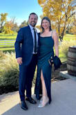 A gorgeous dress for a formal wedding! I got so many compliments! I am actually a 34G or 36F bust and typically a size 10 or 12 dress or jeans. I would typically buy a large but sized up to the XL for my chest and it was perfect. The only alteration I had done was to get it hemmed. The slit does come up pretty high when you sit down but I luckily had a black wrap for the cool evening that I could lay across my lap. The cowl neckline was sexy but modest and the ruching across the stomach was flattering on a curvy midsection. Definitely recommend! - Sarah C.