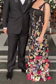 I wore this dress to a black tie wedding in Colombia and the amount of compliments I received was insane! I sized up after reading the reviews. I'm a true small but definitely needed the medium. The bust was slightly large since I'm smaller in that department, and the dress was too long (this is normal for me). I had it hemmed and had the sides taken in a little bit at the bust which made it fit perfectly. I also went without a bra which is always a plus! - Lindsay L.