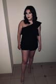 I had to order an XL because my size was sold out. My friends safety pinned me up and I was good to go. Great outfit for a night out! - Deanna D.