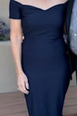 This dress fit like a glove. I absolutely love how the material was stretchy and it has a beautiful neckline too. I received at least 5 compliments on this dress at one event. Highly recommend it! - Linda M.