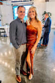 I loved this dress! The color and material were beautiful. It was also very forgiving and the slit didn't come up too high. - Tricia M.