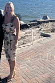 I loved this dress! It's definitely form-fitting, but wasn't overly tight or uncomfortable. It does not have a lot of stretch to it. I originally ordered a medium, but it was too loose. I have a small frame, but a larger chest. I have little to no curves in my hips or butt, so I'd suggest a size up for a curvier figure. Even with a larger bust, the small fit perfectly. The exchange process was easy as well. - Kristen O.