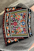 This skirt fit perfectly. Love the embroidery and the length. I wore this with black leggings and boots. Comfortable and zips up in the back. - Laurie H.