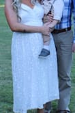 I bought this dress for my wedding reception. It was very pretty and comfortable for dancing, eating, etc. The only thing I had to do was see the bust together because it came out a little bit big on me. I was more comfortable having it come together a bit higher. - Sierra D.