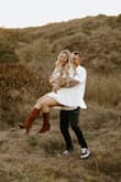 Wore this dress for my engagement photos! Worked perfectly and was not too short. If you don't want too much cleavage you can close the top with fabric tape or a safety pin. Material wrinkles easily! - Kelsey S.