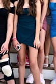 My daughter wore this for her 8th grade continuation and she loved it. The color is so striking! - Angela T.