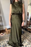 I wanted to love this dress so much! It just didn't fit right anywhere. Usually halter neck is my preferred dress type, but it was way too baggy on top and made me look super fat on the bottom. Even if the dress was not flattering to my shape in particular, I have a hard time imagining this would fit anyone without extreme alterations unless they are very tall and very thin with minimal curves. - Gabrielle A.
