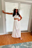 I did have it altered a little, cut the bottom layer of fabric to knee length. It was perfect! - Brooke B.