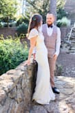 This dress is absolutely beautiful and I got tons of compliments on it. The fit was true to size. It was more lightweight than some of the other dresses I tried on and a little stretchy so it was super comfortable to wear all day. - Hope T.